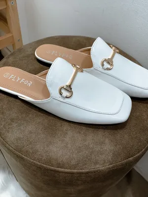 Mules bianche con morsetto